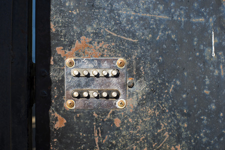 old metallic door with built in vintage code lock