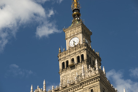top fragment of famous Warsaw landmark Palace of Culture and Science by daytimeのeditorial素材