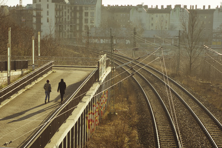 morning autumn cityscape with walking human figures in Wedding, Berlinの写真素材