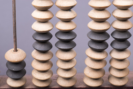 vintage wooden abacus fragment with focus on beads