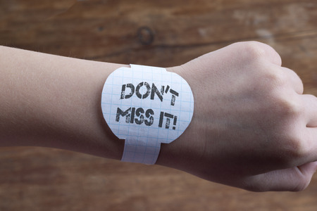 hand with handmade  paper watches and don?t miss it exclamation printの写真素材