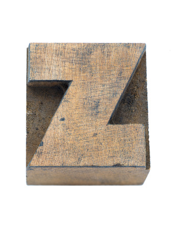 vintage wooden capital letter Z from letterpress set isolated on whiteの写真素材