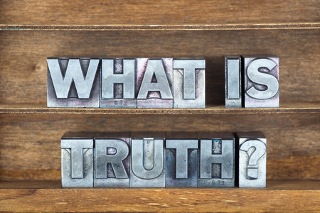 what is truth question made from metallic letterpress type on wooden tray