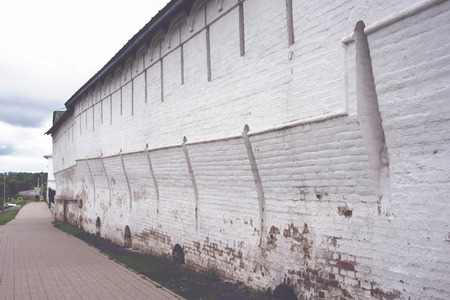 ancient whitewashed monastery wall in Yaroslavl, Russiaの写真素材