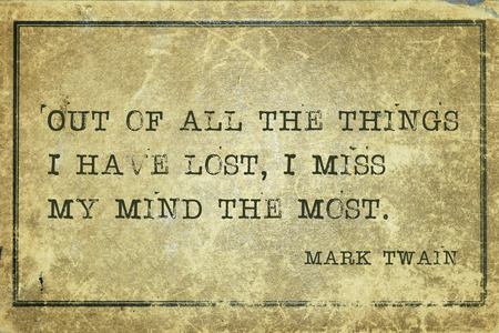 Out of all the things I have lost, I miss my mind the most - famous American writer Mark Twain quote printed on grunge vintage cardboardの写真素材