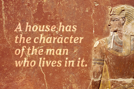 A house has the character of the man who lives in it - ancient Egyptian proverb printed on red grunge wall 
の写真素材