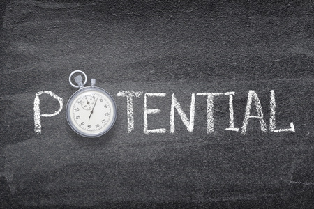 potential word handwritten on chalkboard with vintage precise stopwatch used instead of Oの写真素材