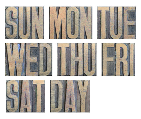 weekdays abbreviation set made from narrow wooden letterpress on white background, every symbol is 1500 pixels in heightの写真素材