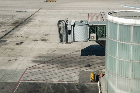 empty airport gate exterior by bright sunny dayの写真素材