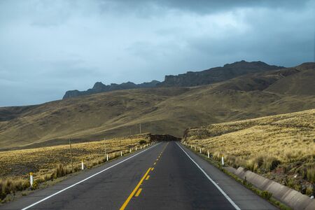 stormy clouds above altitude mountain driveway in Peru