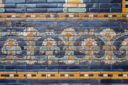 detailed flower ornament on glazed ceramic wall from ancient Babylon