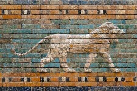 walking lion relief on glazed ceramic wall from ancient Babylonの写真素材