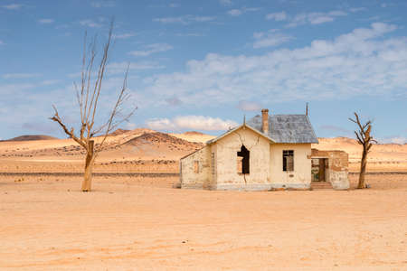 desert landscape with abandoned train station in Namibia