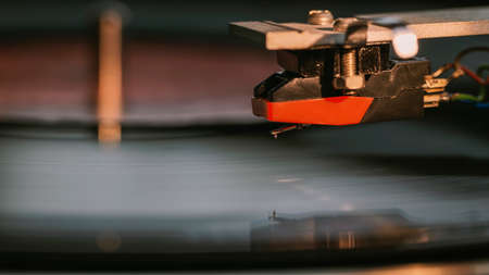 vintage turntable fragment with focus on stylusの写真素材