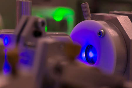 ultraviolet laser light generation inside complicated scientific system, focus on beam spotの写真素材