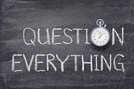 question everything phrase written on chalkboard with vintage precise stopwatchのeditorial素材