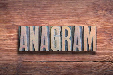 anagram word combined on vintage varnished wooden surfaceの写真素材