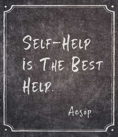 To write well, express yourself like the common people, but think like a wise man - ancient Greek philosopher Aristotle quote printed on grunge vintage cardboardの写真素材