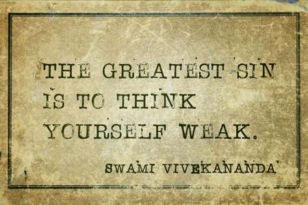 The greatest sin is to think yourself weak - quote of Indian philosopher Swami Vivekananda printed on vintage cardboardの写真素材
