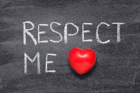 respect me phrase written on chalkboard with red heart symbolの写真素材