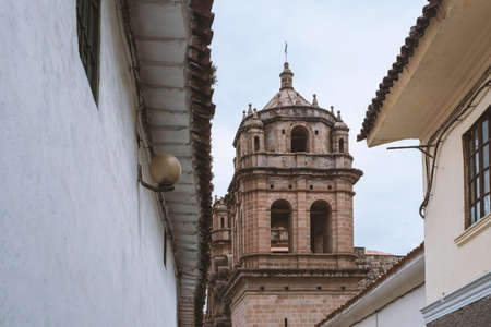 view to Catholic Cathedral dome from city street in Cusco, Peruの写真素材