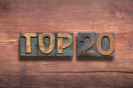 top 20 combined on vintage varnished wooden surfaceの写真素材