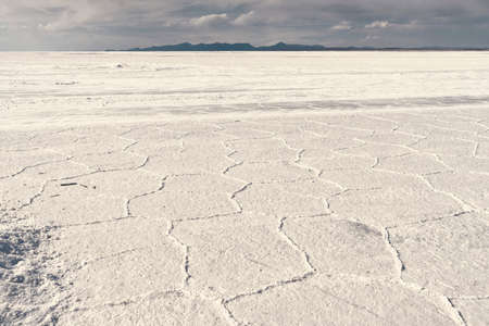 famous Uyuni Salt Flats by bright sunny dayの写真素材
