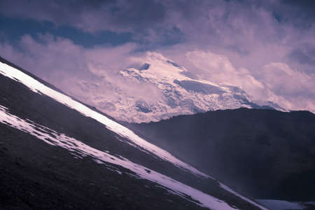 stormy landscape of cold snowy Andes peaks in Peruの写真素材