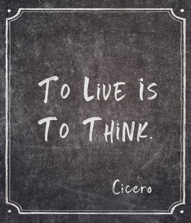 To live is to think - ancient Roman philosopher Cicero quote written on framed chalkboardの写真素材