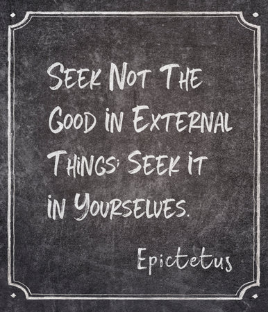 Seek not the good in external things;seek it in yourselves - ancient Greek philosopher Epictetus quote written on framed chalkboardの写真素材