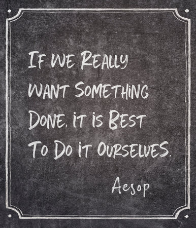 If we really want something done, it is best to do it ourselves - famous ancient Greek story teller Aesop quote printed on framed chalkboardの写真素材