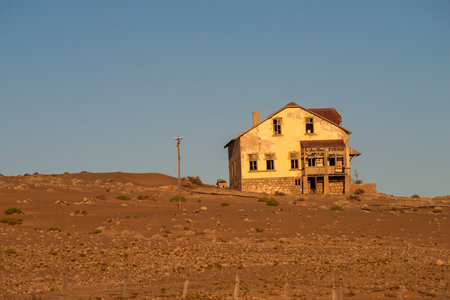 abandoned house in desert of Namibia by early morningの写真素材