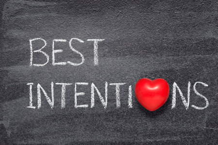 best intentions phrase written on chalkboard with red heart symbolの写真素材