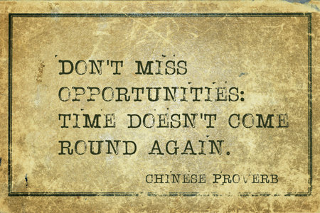 Don't miss opportunities: time doesn't come round again - ancient Chinese proverb printed on grunge vintage cardboardの写真素材