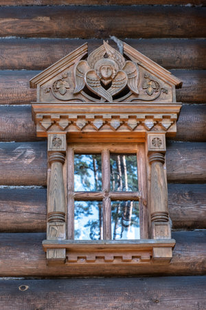 traditional wooden carving window of orthodox church from Karelia, Russiaの写真素材