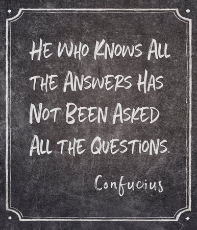 He who knows all the answers has not been asked all the questions - ancient Chinese philosopher Confucius quote written on framed chalkboardの写真素材