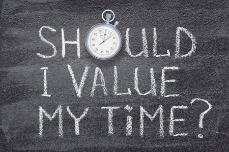 should I value my time question written on chalkboard with vintage precise stopwatchの写真素材
