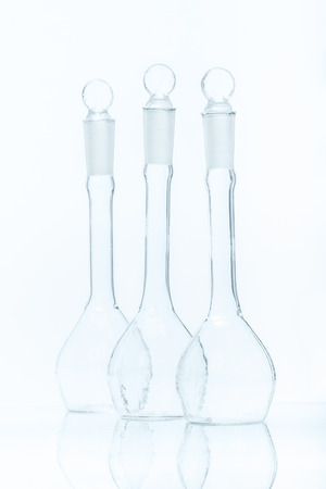 Set of three empty flat-bottomed flasks for measurementsの写真素材