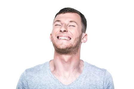 Happy young man on whiteの写真素材