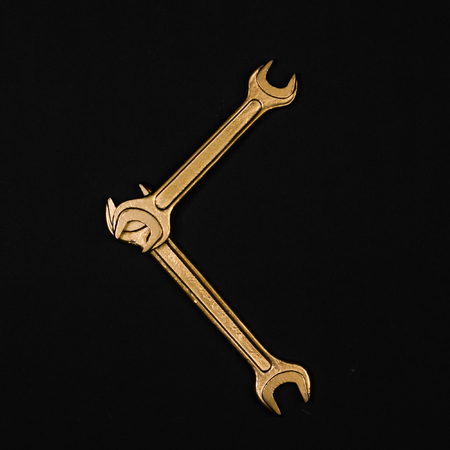 Letter C. Alphabet made of golden repair tools. Creative fontの写真素材