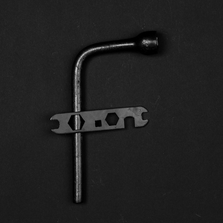 Letter F. Alphabet made of repair tools. Creative black and white fontの写真素材