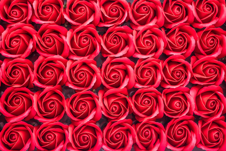 Red rose flowers made from soap close-up backgroundの写真素材