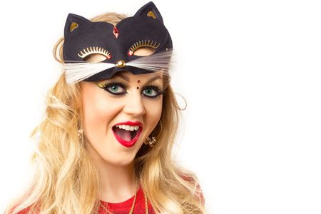 portrait of young blonde with kitty-style make-up の写真素材