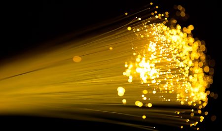 yellow fiber optics cable close up shotの写真素材