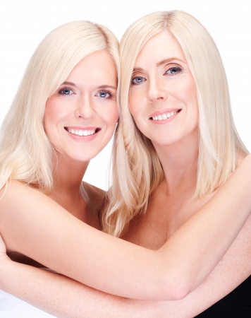 mother and daughter- natural beauty, over whiteの写真素材