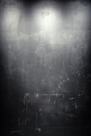 old grunge black wall, spot lightingの写真素材