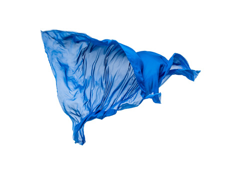 abstract piece of blue fabric flying, isolated on white, design elementの写真素材