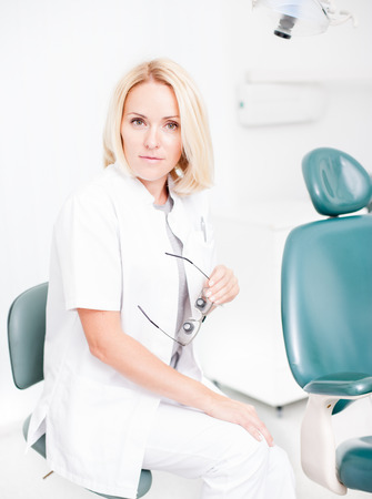 young professional female dentist in dental clinicの写真素材