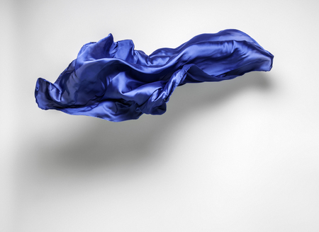 abstract piece of blue fabric flying, art object, design elementの写真素材