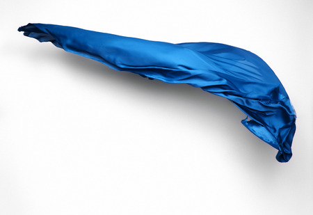 abstract piece of blue fabric flying, high-speed studio shotの写真素材